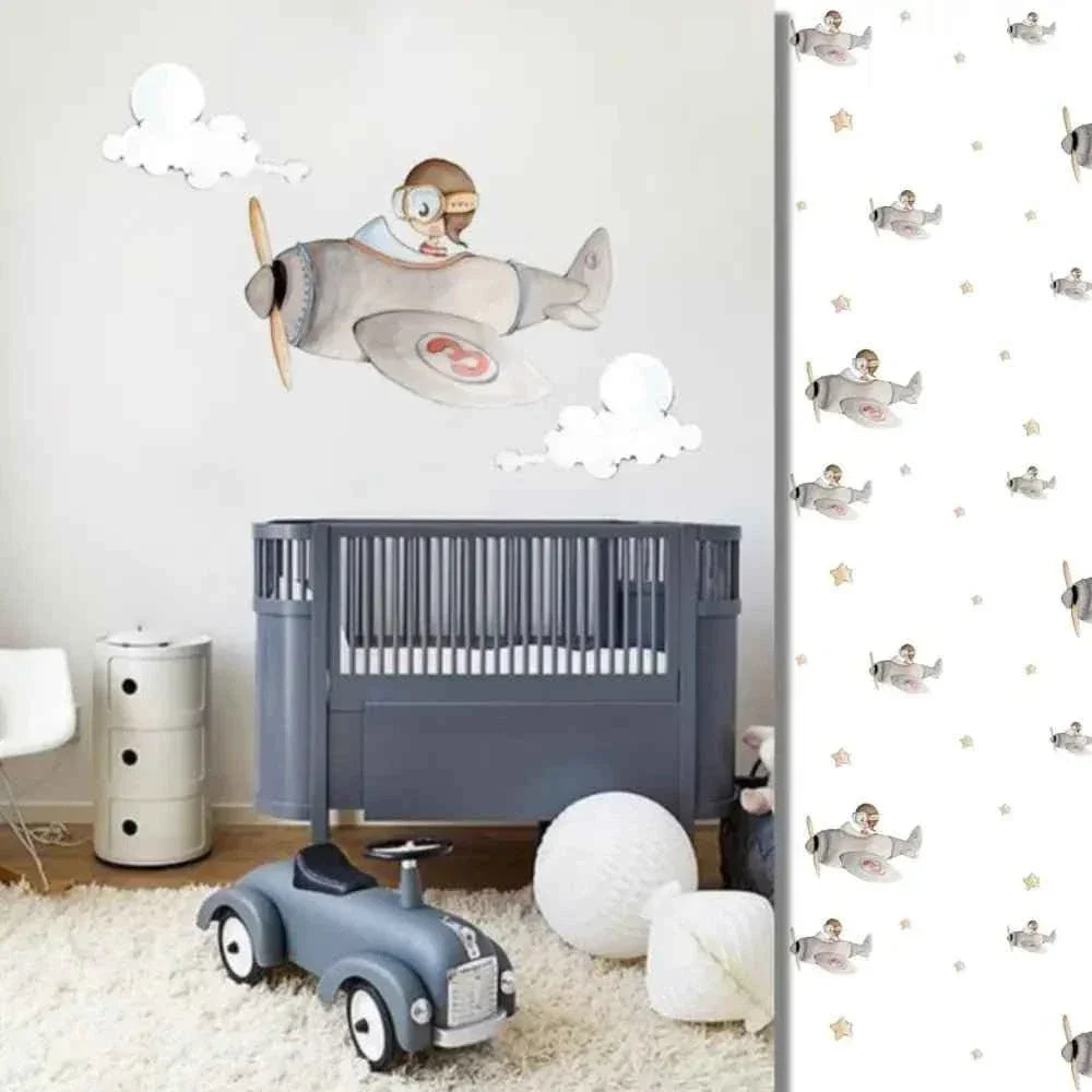 Nursery wallpaper with vintage airplane and pilot illustration, gray crib, and toy car
