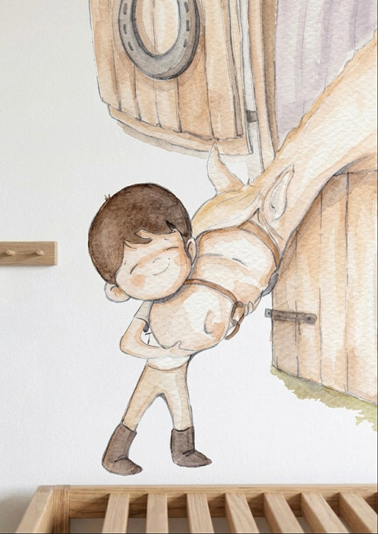 Vinilo decorativo infantil que muestra a un niño abrazando a un caballo, creando una escena tierna para la habitación.