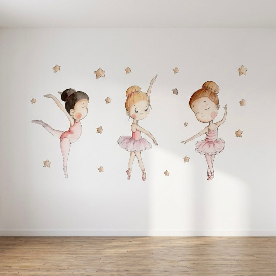Three adorable ballet dancers are depicted on a wall, each in a graceful pose, wearing pink tutus and ballet shoes. Surrounding them are small golden stars, creating a whimsical and enchanting atmosphere perfect for a childs room.