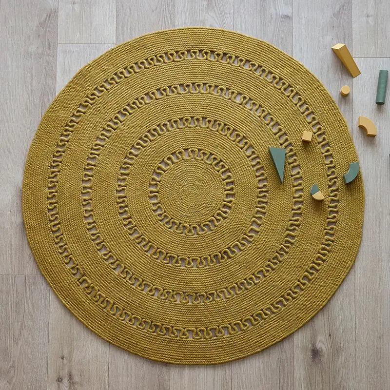 Tapis laine feutrée rond ajourée BIBEK MANGUE M - Sueños de Cigueña