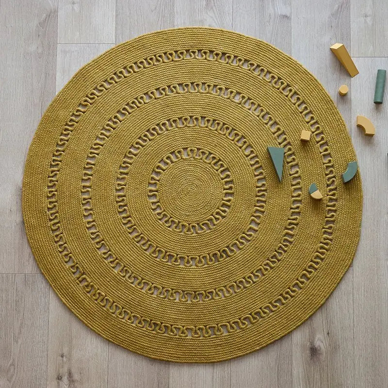 Tapis laine feutrée rond ajourée BIBEK MANGUE S - Sueños de Cigueña