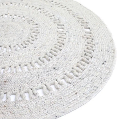 Tapis laine feutrée rond ajourée BIBEK NATUREL M - Sueños de Cigueña