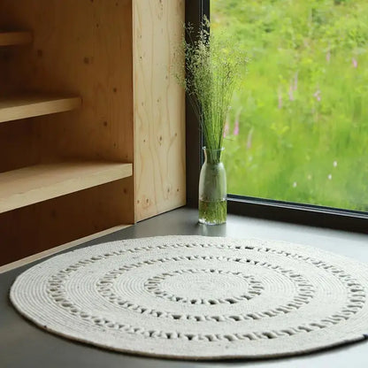 Tapis laine feutrée rond ajourée BIBEK NATUREL M - Sueños de Cigueña