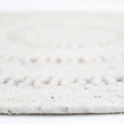 Tapis laine feutrée rond ajourée BIBEK NATUREL S - Sueños de Cigueña