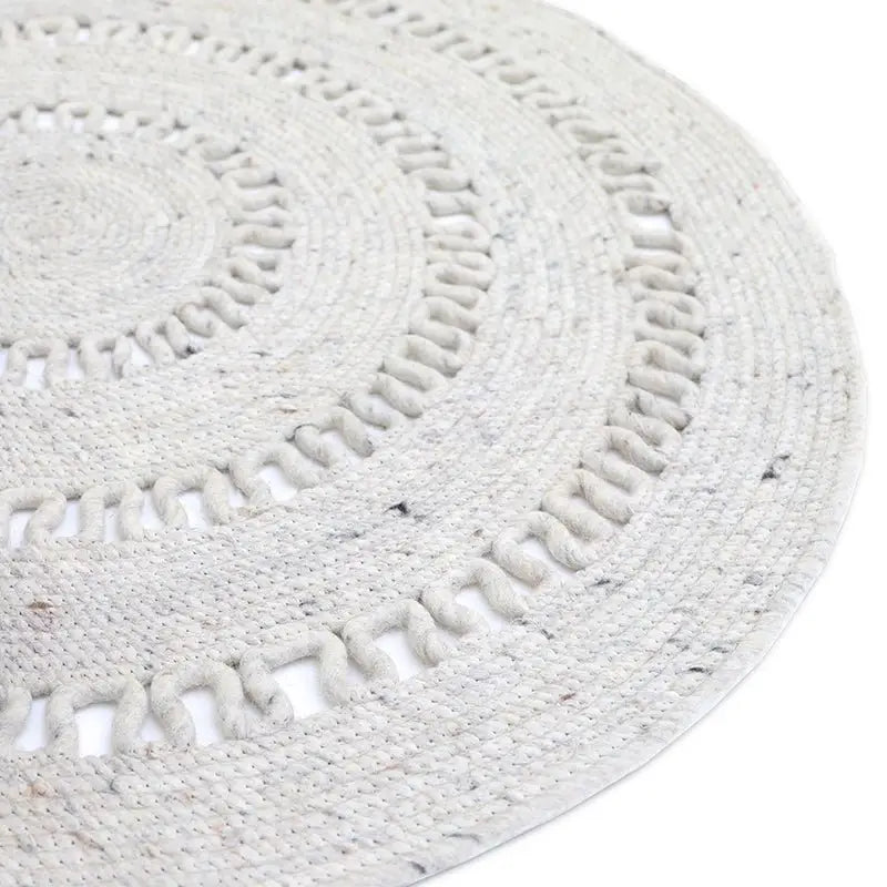 Tapis laine feutrée rond ajourée BIBEK NATUREL S - Sueños de Cigueña