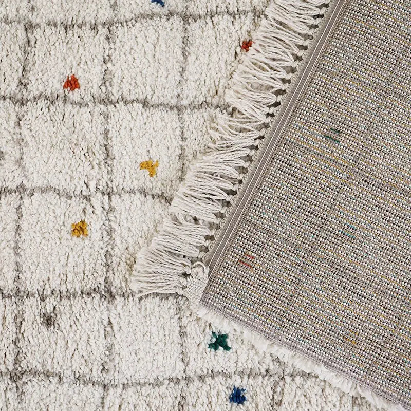 Tapis chambre enfant à pois multicolores RITTAH M - Sueños de Cigueña