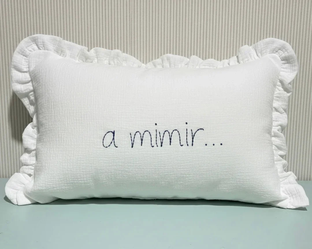 White baby pillow with ruffled edges and 'a mimir...' embroidered, nursery decor